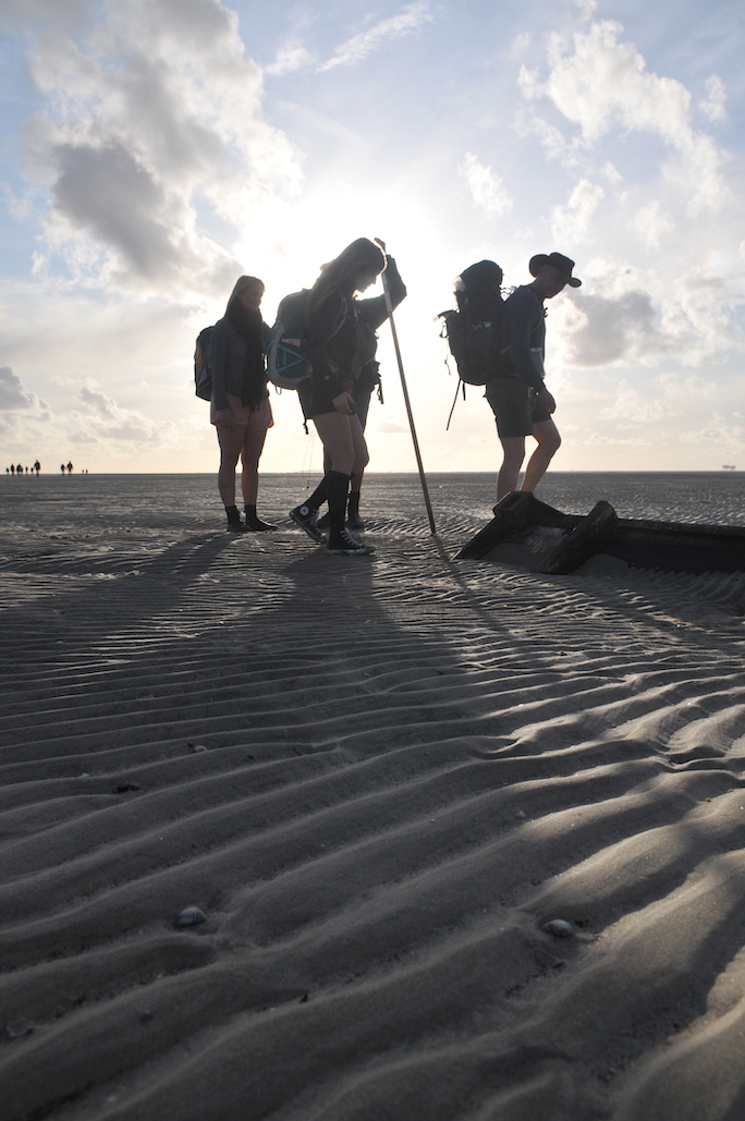 people walking on sand t'rif